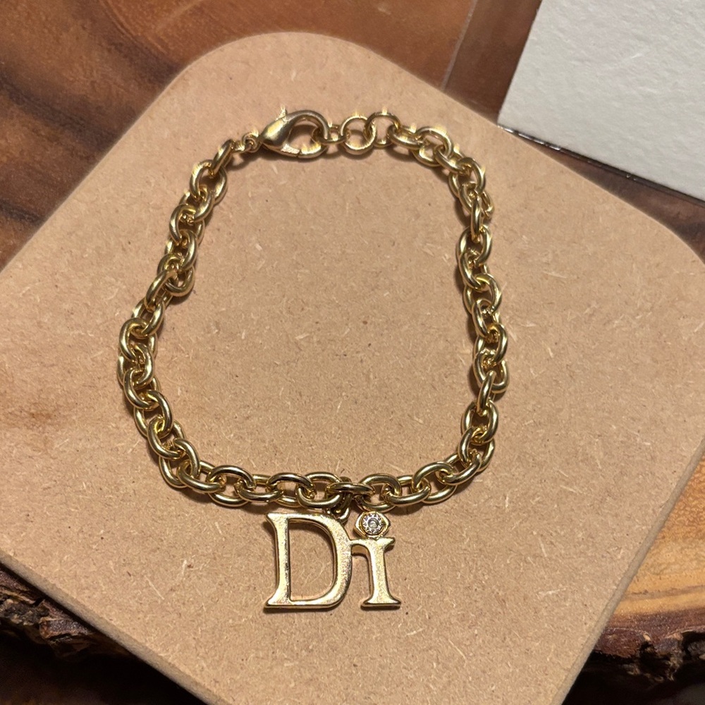 Diamond International Gold Chain Bracelet